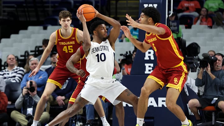 Penn State Nittany Lions forward Josh Reed (10) looks to pass the ball as USC Trojans forward Jacob Cofie (6) defends during the second half at Bryce Jordan Center.