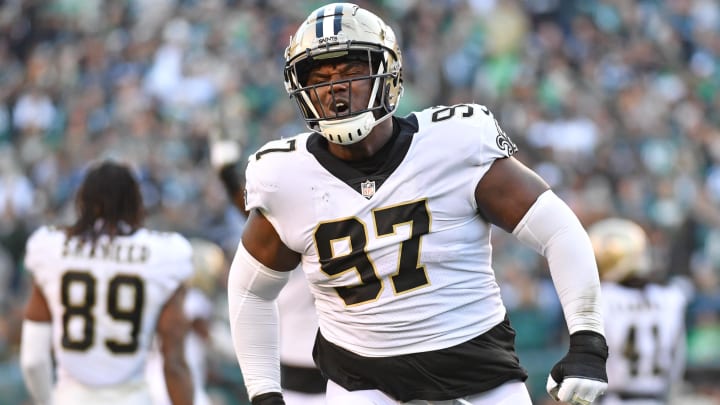 Jan 1, 2023; Philadelphia, Pennsylvania, USA; New Orleans Saints defensive end Malcolm Roach (97) celebrate a stop on fourth down during the fourth quarter against the Philadelphia Eagles at Lincoln Financial Field. Mandatory Credit: Eric Hartline-USA TODAY Sports