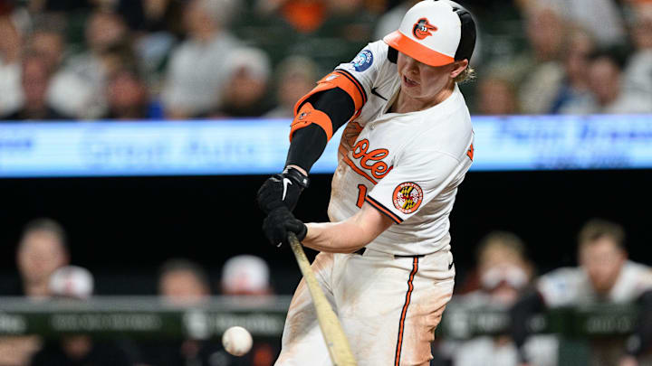 Apr 30, 2025; Baltimore, Maryland, USA; Baltimore Orioles outfielder Heston Kjerstad (13) hits a single during the eighth inning against the New York Yankees at Oriole Park at Camden Yards.