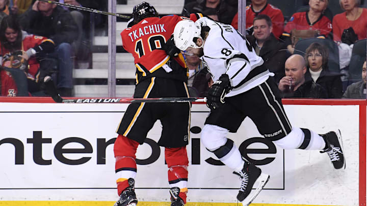Calgary Flames left wing Matthew Tkachuk and Los Angeles Kings defenseman Drew Doughty.