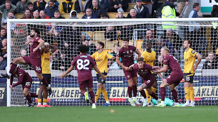 Manchester City snatched three points in the final minute of additional time at Molineux