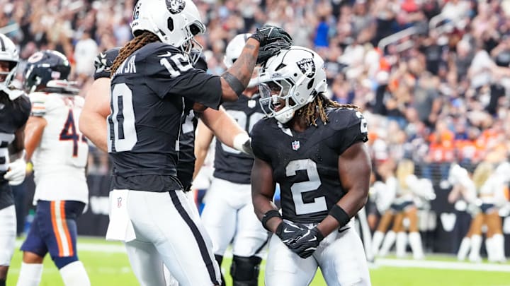 Sep 28, 2025; Paradise, Nevada, USA; Las Vegas Raiders running back Ashton Jeanty (2) celebrates a touchdown during the second half against the Chicago Bears at Allegiant Stadium. Mandatory Credit: Stephen R. Sylvanie-Imagn Images