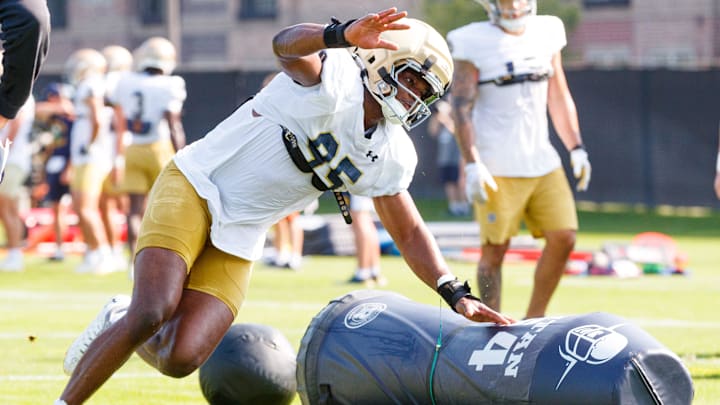 Notre Dame defensive lineman Bryce Young knocks down a dummy during a football practice at Irish Athletic Center on Wednesday, Aug. 6, 2025, in South Bend. Notre Dame defensive lineman Bryce Young knocks down a dummy during a football practice at Irish Athletic Center on Wednesday, Aug. 6, 2025, in South Bend.