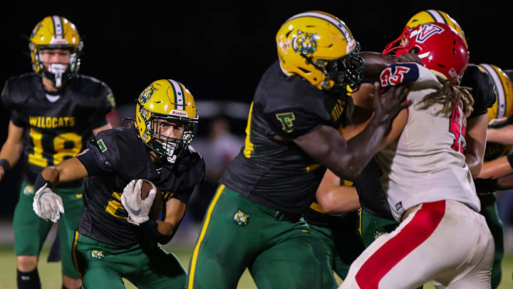 Forest Wildcats Jayden Serrano (25) looks for a hole in the first half. The Forest Wildcats hosted the Vanguard Knights at Forest High School in Ocala, FL on Friday, November 1, 2024. [Doug Engle/Ocala Star Banner]