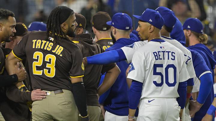 Jun 19, 2025; Los Angeles, California, USA; San Diego Padres right fielder Fernando Tatis Jr. (23) and Los Angeles Dodgers shortstop Mookie Betts (50) engage on the field after benches cleared in the eighth inning at Dodger Stadium. Mandatory Credit: Jayne Kamin-Oncea-Imagn Images Jun 19, 2025; Los Angeles, California, USA; San Diego Padres right fielder Fernando Tatis Jr. (23) and Los Angeles Dodgers shortstop Mookie Betts (50) engage on the field after benches cleared in the eighth inning at Dodger Stadium. Mandatory Credit: Jayne Kamin-Oncea-Imagn Images