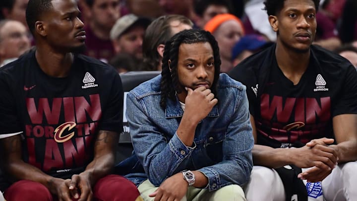 Darius Garland on the bench during a Cavaliers playoff game.
