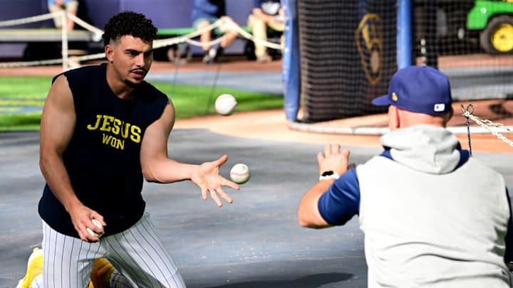 Oct 2, 2024; Milwaukee, Wisconsin, USA; Milwaukee Brewers shortstop Willy Adames (27) warms up before game two of the Wildcard round for the 2024 MLB Playoffs against the New York Mets at American Family Field. Oct 2, 2024; Milwaukee, Wisconsin, USA; Milwaukee Brewers shortstop Willy Adames (27) warms up before game two of the Wildcard round for the 2024 MLB Playoffs against the New York Mets at American Family Field.