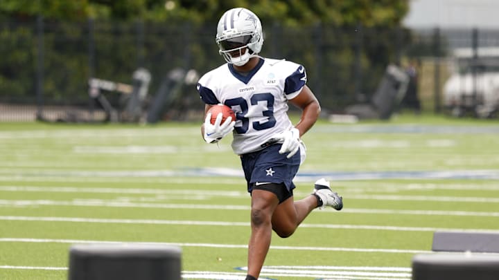 Dallas Cowboys RB Javonte Williams goes through a drill during practice at the Ford Center at the Star Training Facility.