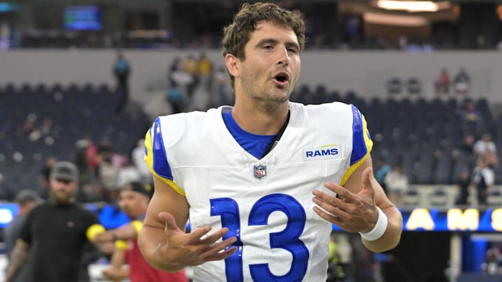 Aug 9, 2025; Inglewood, California, USA;  Los Angeles Rams quarterback Stetson Bennett IV (13) leaves the field after the game against the Dallas Cowboys at SoFi Stadium. Mandatory Credit: Jayne Kamin-Oncea-Imagn Images