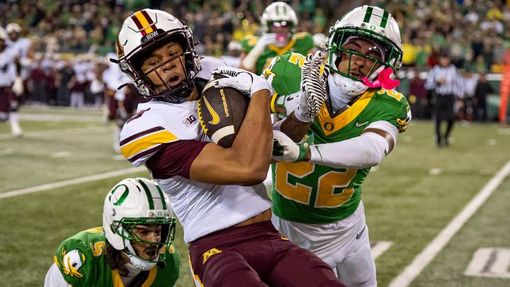 Oregon defensive back Jadon Canady, right, pushes Minnesota wide receiver Jalen Smith out of bounds as the Oregon Ducks host the Minnesota Golden Gophers on Nov. 14, 2025, at Autzen Stadium in Eugene, Oregon.