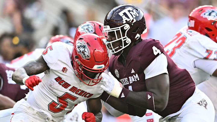 Sep 2, 2023; College Station, Texas, USA; Texas A&M Aggies defensive lineman Shemar Stewart (4) and New Mexico Lobos running back Jacory Croskey-Merritt (5) in action during the first half at Kyle Field. Mandatory Credit: Maria Lysaker-Imagn Images