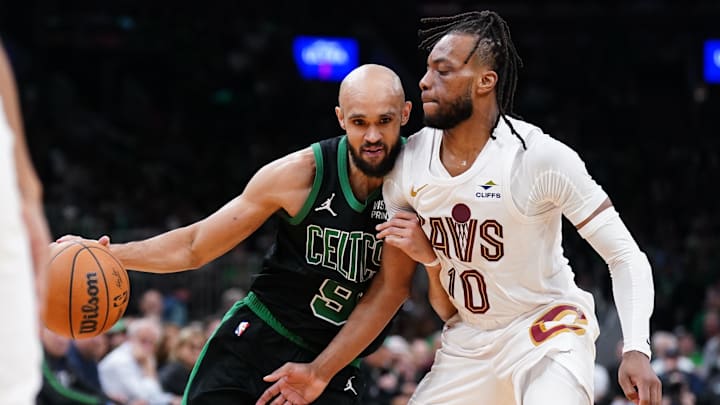 May 15, 2024; Boston, Massachusetts, USA; Boston Celtics guard Derrick White (9) drives the ball against Cleveland Cavaliers guard Darius Garland (10) in the third quarter during game five of the second round for the 2024 NBA playoffs at TD Garden. Mandatory Credit: David Butler II-Imagn Images