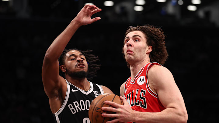 Nov 1, 2024; Brooklyn, New York, USA; Chicago Bulls guard Josh Giddey (3) drives to the basket against Brooklyn Nets guard Cam Thomas (24) during the first quarter at Barclays Center. Mandatory Credit: Vincent Carchietta-Imagn Images