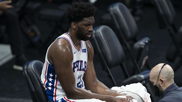 February 9, 2021; Sacramento, California, USA; Philadelphia 76ers center Joel Embiid (21) is tended to on the bench during the third quarter against the Sacramento Kings at Golden 1 Center. Mandatory Credit: Kyle Terada-Imagn Images February 9, 2021; Sacramento, California, USA; Philadelphia 76ers center Joel Embiid (21) is tended to on the bench during the third quarter against the Sacramento Kings at Golden 1 Center. Mandatory Credit: Kyle Terada-Imagn Images
