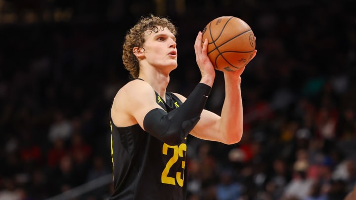 Utah Jazz forward Lauri Markkanen (23) shoots a free throw against the Atlanta Hawks in the second half at State Farm Arena.