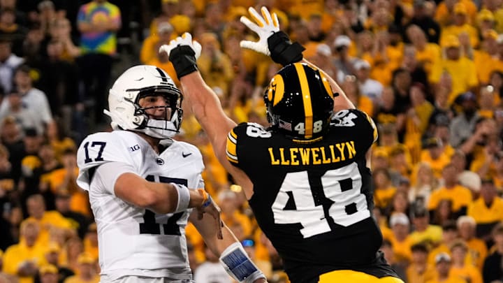 Iowa Hawkeyes defensive end Max Llewellyn (48) pressures Penn State Nittany Lions quarterback Ethan Grunkemeyer (17).