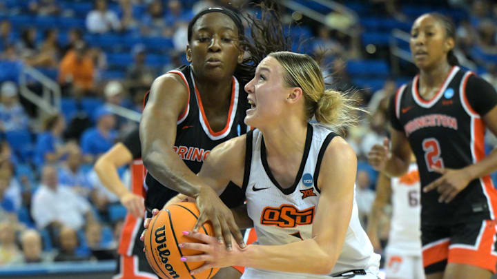 Mar 21, 2026; Los Angeles, CA, USA; Oklahoma State Cowboys guard Amari Whiting (1) is defended by Princeton Tigers guard Fadima Tall (5) in the second half at Pauley Pavilion. Mandatory Credit: Jayne Kamin-Oncea-Imagn Images