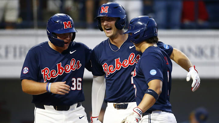 May 30, 2025; Oxford, Mississippi, USA; Mississippi Rebels infielder Judd Utermark (27) reacts with infielder Will Furniss (36) and infielder Luke Hill (7) after a home run during the third inning against the Murray State Racers.  Mandatory Credit: Petre Thomas-Imagn Images