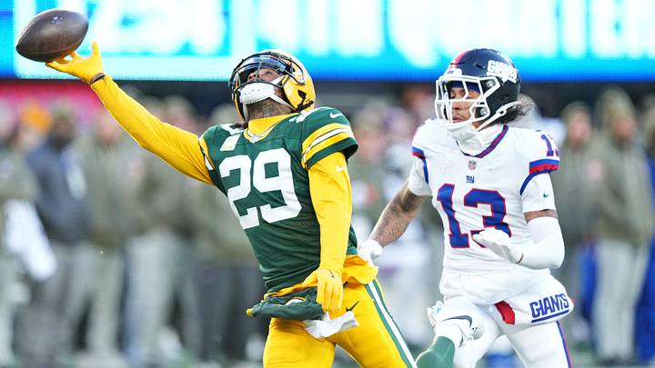 Nov 16, 2025; East Rutherford, New Jersey, USA; Green Bay Packers safety Xavier McKinney (29) misses an interception on pass intended for New York Giants wide receiver Jalin Hyatt (13) during the fourth quarter at MetLife Stadium. Mandatory Credit: Robert Deutsch-Imagn Images