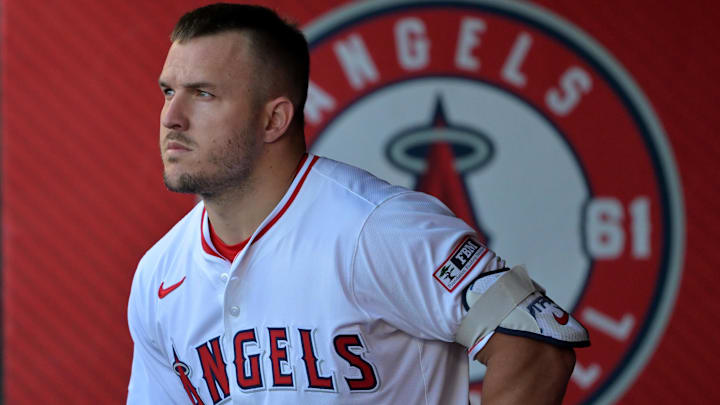 Jul 28, 2025; Anaheim, California, USA; Los Angeles Angels designated hitter Mike Trout (27) looks on from the dugout during the game against the Texas Rangers at Angel Stadium. Mandatory Credit: Jayne Kamin-Oncea-Imagn Images Jul 28, 2025; Anaheim, California, USA; Los Angeles Angels designated hitter Mike Trout (27) looks on from the dugout during the game against the Texas Rangers at Angel Stadium. Mandatory Credit: Jayne Kamin-Oncea-Imagn Images