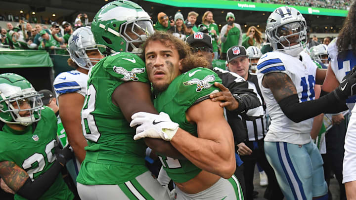 Philadelphia Eagles safety Sydney Brown is held back after fight in the tunnel against the Dallas Cowboys.