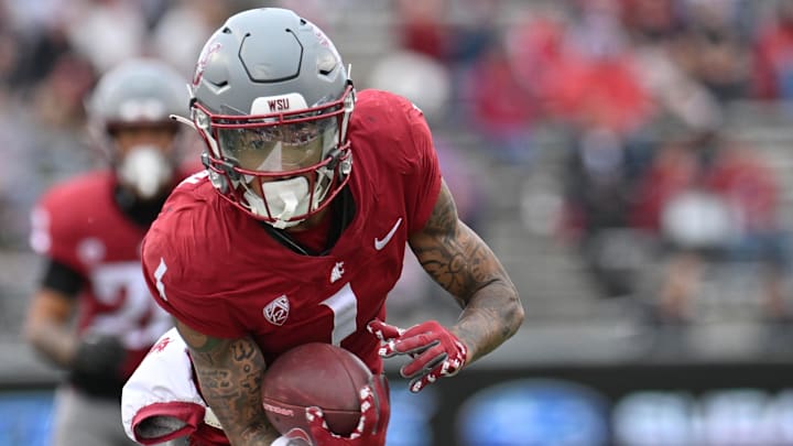 Oct 19, 2024; Pullman, Washington, USA; Washington State Cougars wide receiver Kris Hutson (1) carries the ball after a catch against the Hawaii Warriors in the second half at Gesa Field at Martin Stadium. Washington State won 42-10. Mandatory Credit: James Snook-Imagn Images