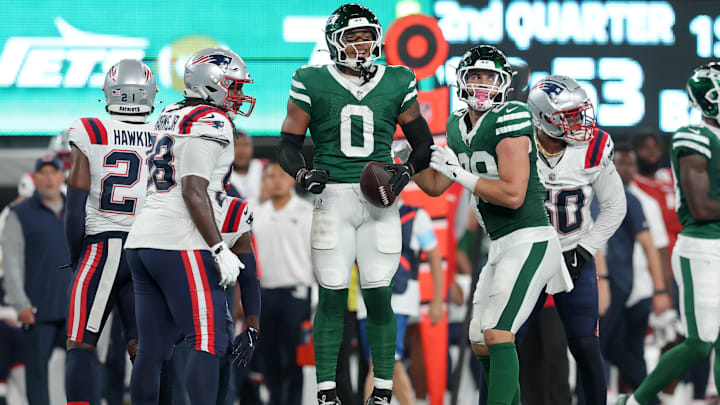 Sep 19, 2024; East Rutherford, New Jersey, USA; New York Jets running back Braelon Allen (0) reacts after a run against the New England Patriots during the second quarter at MetLife Stadium. 