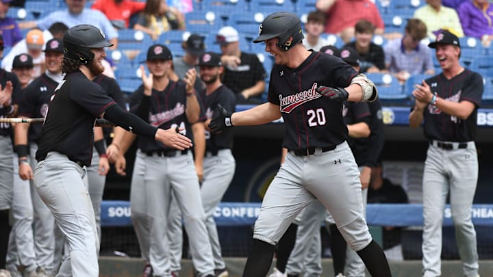 South Carolina batter Ethan Petry is congratulated by teammates after hitting a home run against the LSU Tigers in the 2023 SEC Baseball Tournament