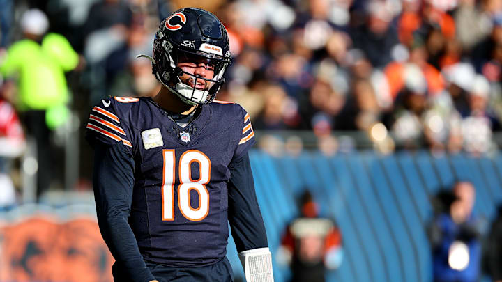 Nov 10, 2024; Chicago, Illinois, USA; Chicago Bears quarterback Caleb Williams (18) reacts after a pass against the New England Patriots during the second half at Soldier Field. Mandatory Credit: Mike Dinovo-Imagn Images