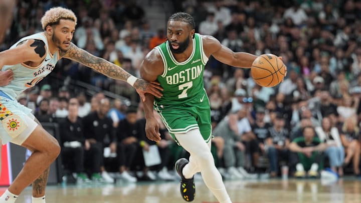Mar 29, 2025; San Antonio, Texas, USA: Boston Celtics guard Jaylen Brown (7) dribbles past San Antonio Spurs forward Jeremy Sochan (10) in the second half at Frost Bank Center. Mandatory Credit: Daniel Dunn-Imagn Images Mar 29, 2025; San Antonio, Texas, USA: Boston Celtics guard Jaylen Brown (7) dribbles past San Antonio Spurs forward Jeremy Sochan (10) in the second half at Frost Bank Center. Mandatory Credit: Daniel Dunn-Imagn Images