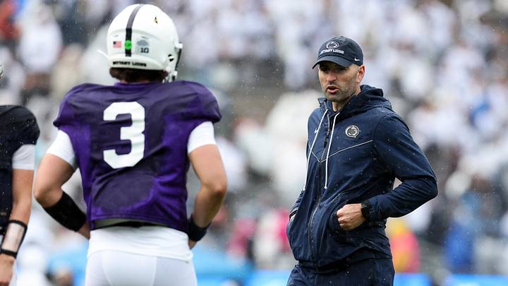 Penn State Nittany Lions quarterback coach Jake Waters talks with quarterback Rocco Becht during the Blue-White spring practice. Penn State Nittany Lions quarterback coach Jake Waters talks with quarterback Rocco Becht during the Blue-White spring practice.