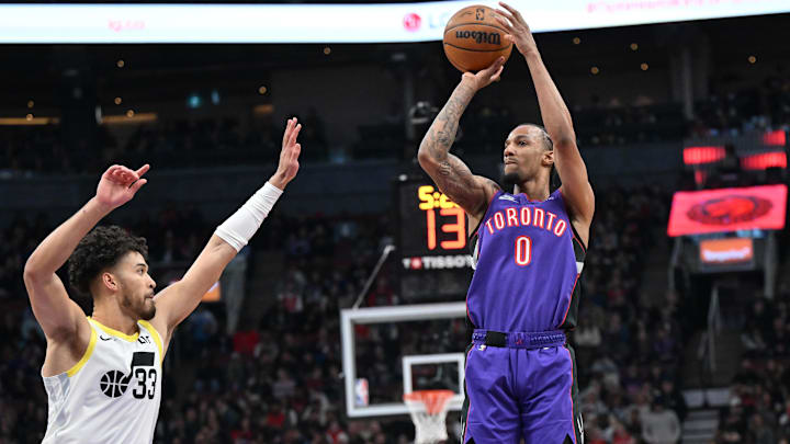 Mar 7, 2025; Toronto, Ontario, CAN; Toronto Raptors guard AJ Lawson (0) shoots the ball as Utah Jazz guard Johnny Jutang (33) defends in the first half at Scotiabank Arena. Mandatory Credit: Dan Hamilton-Imagn Images Mar 7, 2025; Toronto, Ontario, CAN; Toronto Raptors guard AJ Lawson (0) shoots the ball as Utah Jazz guard Johnny Jutang (33) defends in the first half at Scotiabank Arena. Mandatory Credit: Dan Hamilton-Imagn Images
