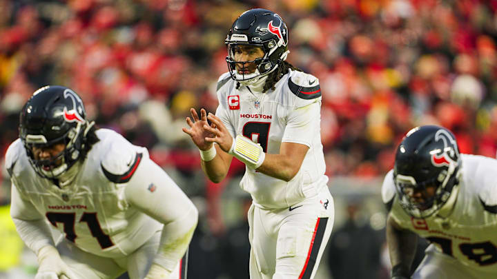Jan 18, 2025; Kansas City, Missouri, USA; Houston Texans quarterback C.J. Stroud (7) gets ready before the snap during the second half against the Kansas City Chiefs in a 2025 AFC divisional round game at GEHA Field at Arrowhead Stadium. Mandatory Credit: Jay Biggerstaff-Imagn Images Jan 18, 2025; Kansas City, Missouri, USA; Houston Texans quarterback C.J. Stroud (7) gets ready before the snap during the second half against the Kansas City Chiefs in a 2025 AFC divisional round game at GEHA Field at Arrowhead Stadium. Mandatory Credit: Jay Biggerstaff-Imagn Images