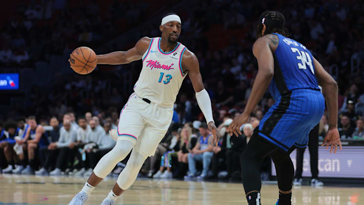 Jan 27, 2025; Miami, Florida, USA; Miami Heat center Bam Adebayo (13) drives to the basket against Orlando Magic center Wendell Carter Jr. (34) during the second quarter at Kaseya Center. Mandatory Credit: Sam Navarro-Imagn Images