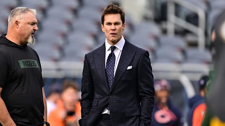 Tom Brady, announcer and owner, is on the field before the game between the Bears and Packers last season. Tom Brady, announcer and owner, is on the field before the game between the Bears and Packers last season.