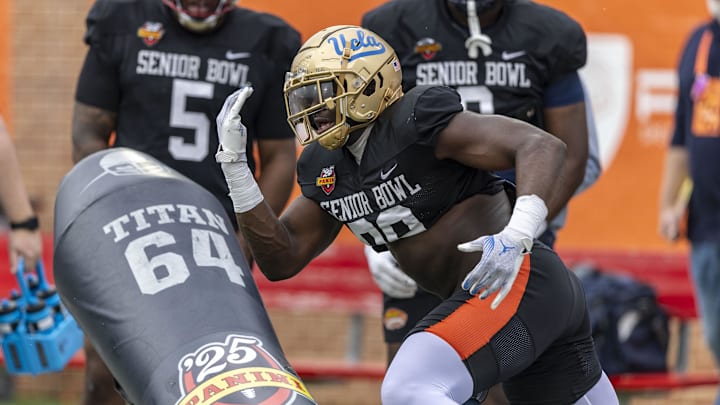 Jan 30, 2025; Mobile, AL, USA; National team defensive lineman Oluwafemi Oladejo of UCLA (99) works through drills during Senior Bowl practice for the National team at Hancock Whitney Stadium. Mandatory Credit: Vasha Hunt-Imagn Images Jan 30, 2025; Mobile, AL, USA; National team defensive lineman Oluwafemi Oladejo of UCLA (99) works through drills during Senior Bowl practice for the National team at Hancock Whitney Stadium. Mandatory Credit: Vasha Hunt-Imagn Images