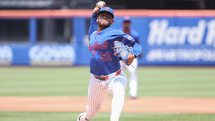 Jun 14, 2026; New York City, New York, USA;  New York Mets starting pitcher Freddy Peralta (51) pitches in the first inning against the Atlanta Braves at Citi Field. Mandatory Credit: Wendell Cruz-Imagn Images