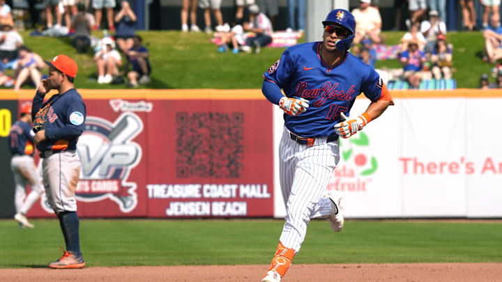 Mar 1, 2026; Port St. Lucie, Florida, USA;  New York Mets left fielder Tyrone Taylor (15) rounds second base after hitting a home run in the fourth inning against the Houston Astros at Clover Park. Mandatory Credit: Jim Rassol-Imagn Images