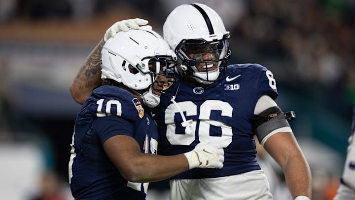 Penn State football running back Nicholas Singleton and offensive tackle Drew Shelton at the Capital One Orange Bowl