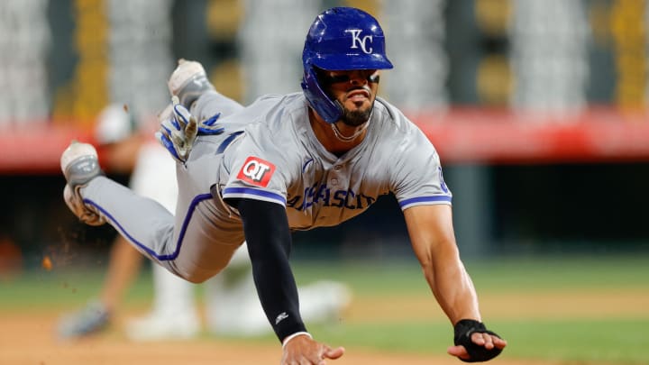 Jul 6, 2024; Denver, Colorado, USA; Kansas City Royals left fielder MJ Melendez (1) slides into third in the seventh inning against the Colorado Rockies at Coors Field. Mandatory Credit: Isaiah J. Downing-USA TODAY Sports