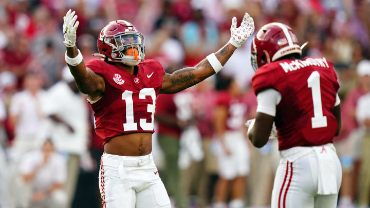 Sep 9, 2023; Tuscaloosa, Alabama, USA; Alabama Crimson Tide defensive back Malachi Moore (13) signal to the fans against the Texas Longhorns during the first quarter at Bryant-Denny Stadium. Mandatory Credit: John David Mercer-USA TODAY Sports Sep 9, 2023; Tuscaloosa, Alabama, USA; Alabama Crimson Tide defensive back Malachi Moore (13) signal to the fans against the Texas Longhorns during the first quarter at Bryant-Denny Stadium. Mandatory Credit: John David Mercer-USA TODAY Sports