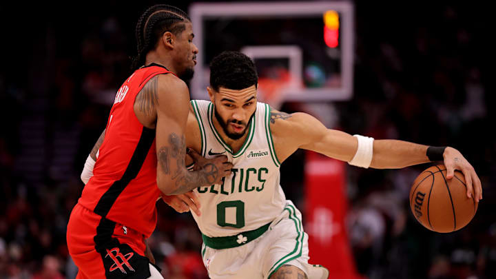 Jan 3, 2025; Houston, Texas, USA; Boston Celtics forward Jayson Tatum (0) handles the ball against Houston Rockets guard Jalen Green (4) during the third quarter at Toyota Center. Mandatory Credit: Erik Williams-Imagn Images Jan 3, 2025; Houston, Texas, USA; Boston Celtics forward Jayson Tatum (0) handles the ball against Houston Rockets guard Jalen Green (4) during the third quarter at Toyota Center. Mandatory Credit: Erik Williams-Imagn Images