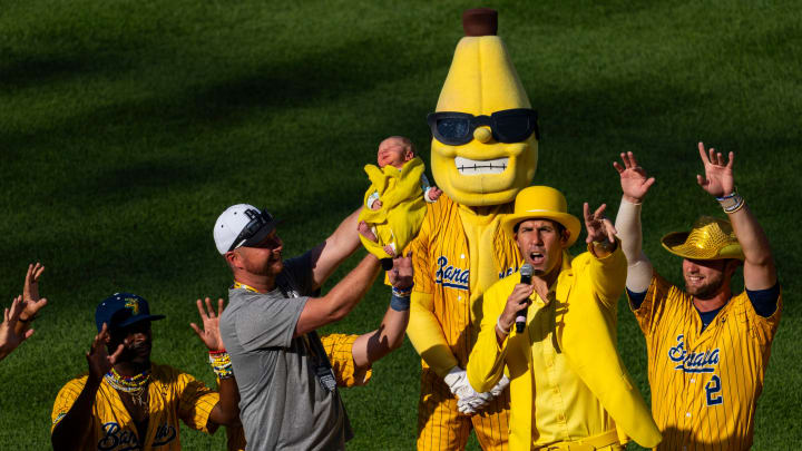 The Savannah Bananas hold up a baby Thursday, June 27, 2024, during a Savannah Bananas World Tour show at Victory Field in Indianapolis. The Savannah Bananas hold up a baby Thursday, June 27, 2024, during a Savannah Bananas World Tour show at Victory Field in Indianapolis.