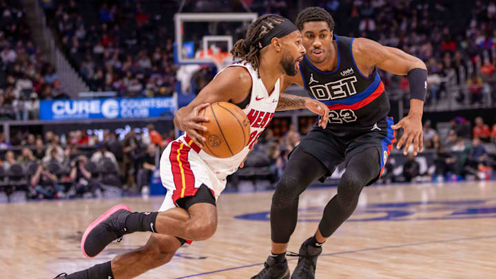 Mar 15, 2024; Detroit, Michigan, USA; Miami Heat guard Patty Mills (88) drives to the basket next to Detroit Pistons guard Jaden Ivey (23): David Reginek-USA TODAY Sports