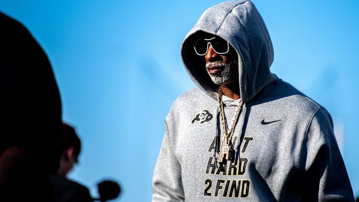 CU football head coach Deion Sanders, or Coach Prime, watches his team warm up before the game against CSU in the Rocky Mountain Showdown at Canvas Stadium on Saturday, Sept. 14, 2024, in Fort Collins, Colo.