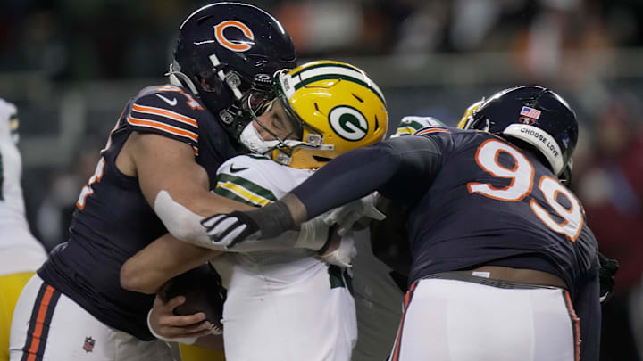 Austin Booker's sack of Jordan Love causes a concussion in Saturday's 22-16 Bears overtime win.