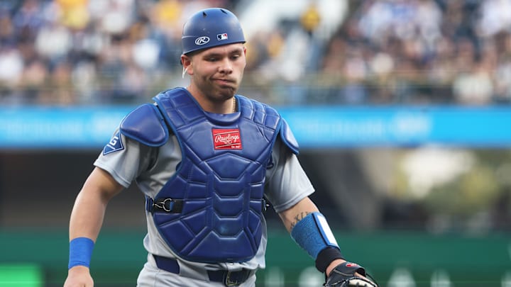 Sep 4, 2025; Pittsburgh, Pennsylvania, USA;  Los Angeles Dodgers catcher Dalton Rushing (68) reacts after committing a first inning throwing error against the Pittsburgh Pirates at PNC Park. Mandatory Credit: Charles LeClaire-Imagn Images