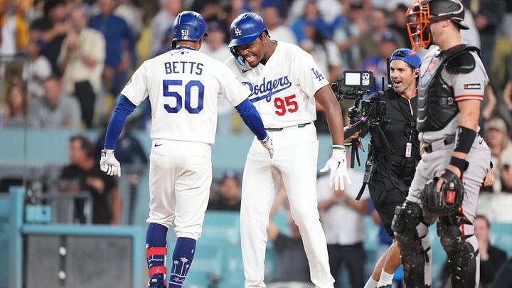 Sep 18, 2026; Los Angeles, California, USA; Los Angeles Dodgers shortstop Mookie Betts (50) celebrates with Los Angeles Dodgers designated hitter Josue de Paula (95) after hitting a two run home run during the eighth inning against the San Francisco Giants at Dodger Stadium. Mandatory Credit: Kirby Lee-Imagn Images Sep 18, 2026; Los Angeles, California, USA; Los Angeles Dodgers shortstop Mookie Betts (50) celebrates with Los Angeles Dodgers designated hitter Josue de Paula (95) after hitting a two run home run during the eighth inning against the San Francisco Giants at Dodger Stadium. Mandatory Credit: Kirby Lee-Imagn Images
