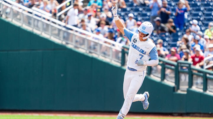 Jun 18, 2024; Omaha, NE, USA; North Carolina Tar Heels center fielder Vance Honeycutt (7) celebrates after hitting a three-run home run against the Florida State Seminoles during the fifth inning at Charles Schwab Field Omaha. Mandatory Credit: Dylan Widger-Imagn Images