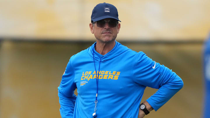 Chargers head coach Jim Harbaugh looks on during training camp